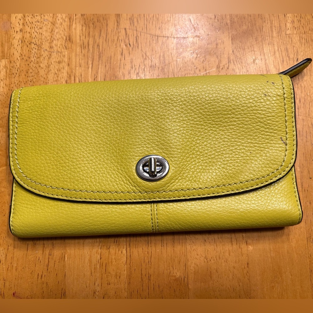 COACH Park yellow pebbled soft leather trifold turn lock wallet